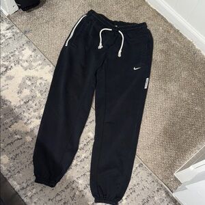 Nike Kids Dark Joggers with White Accents